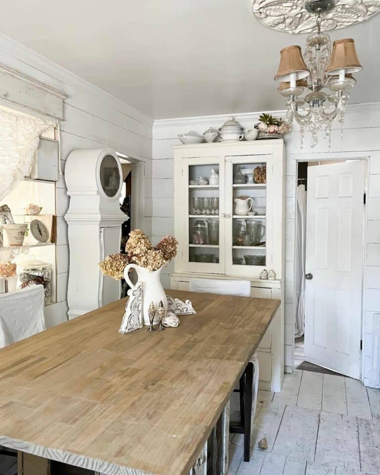 White Dining Room With Antique Grandfather Clock