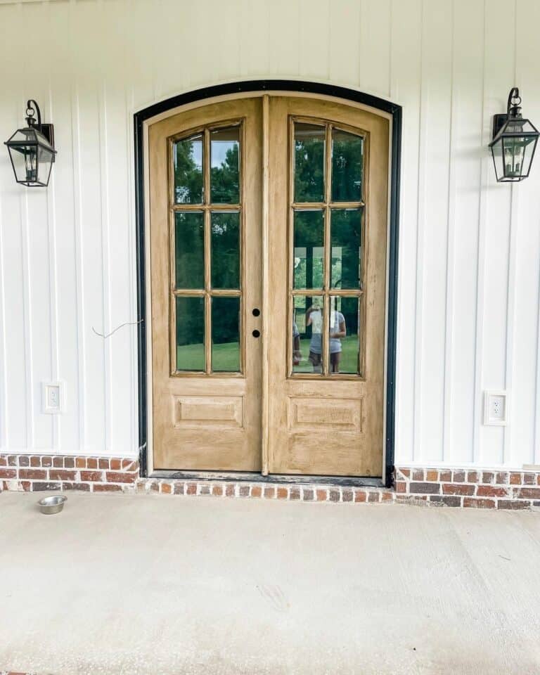White Farmhouse Porch With Double Front Doors