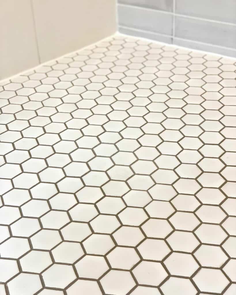 White Hexagon Shower Floor Tiles With Gray Grout