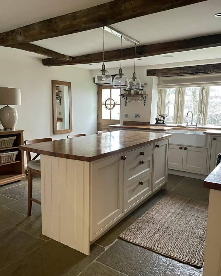 White Kitchen Island With Stained Wood Countertop