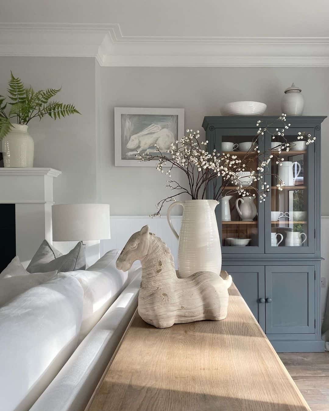 White Living Room With Natural Wood Sofa Table - Soul & Lane