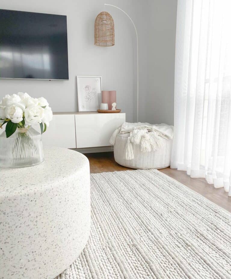 White Living Room With Round Coffee Table