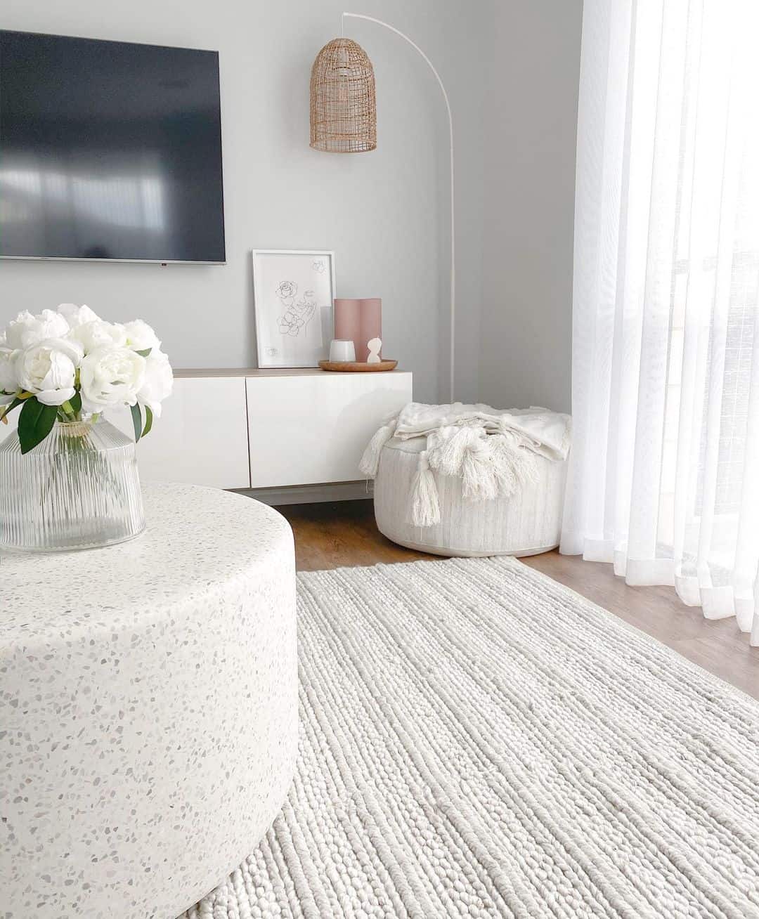 White Living Room With Round Coffee Table - Soul & Lane
