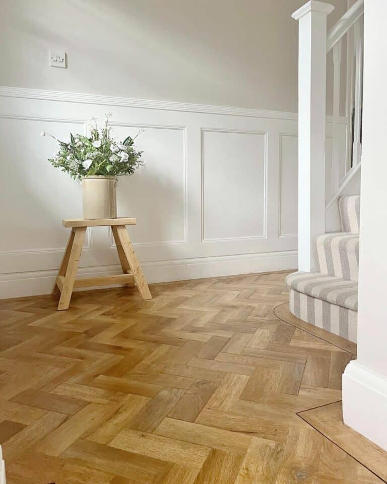 White and Beige Entryway with Herringbone Floors