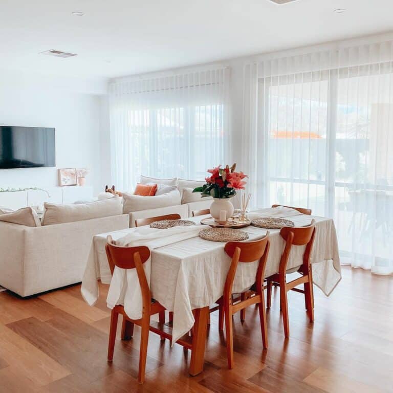 White and Wood Dining Room With Sheer Curtains