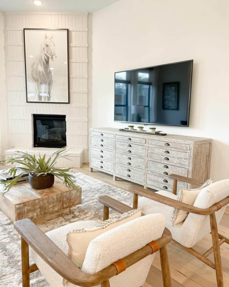 White and Wood Tones in Living Room With Corner Fireplace