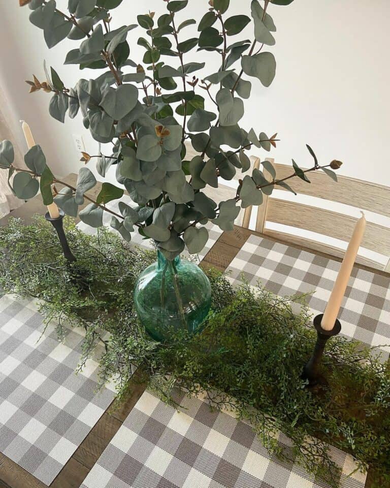 Wood Dining Table With Greenery Centerpiece