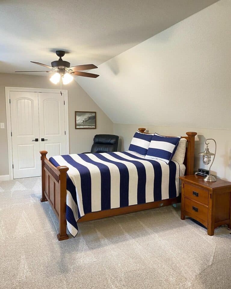 Wood Teen Bed With White and Blue Striped Bedding