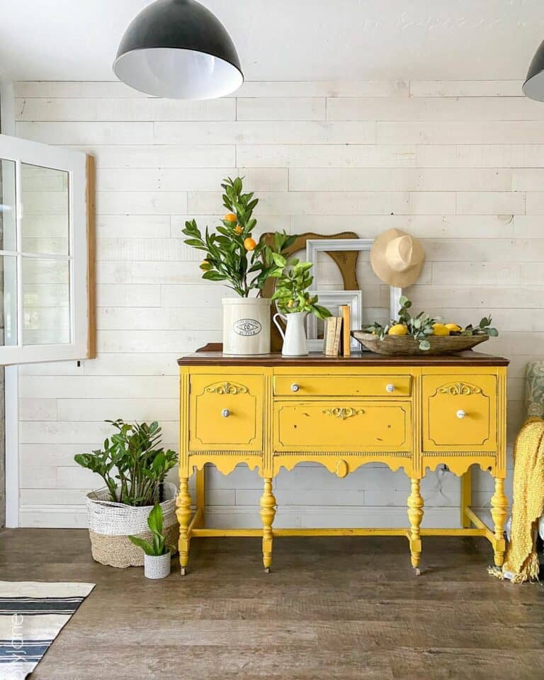Yellow Cabinet and Lemon Plants in Entryway