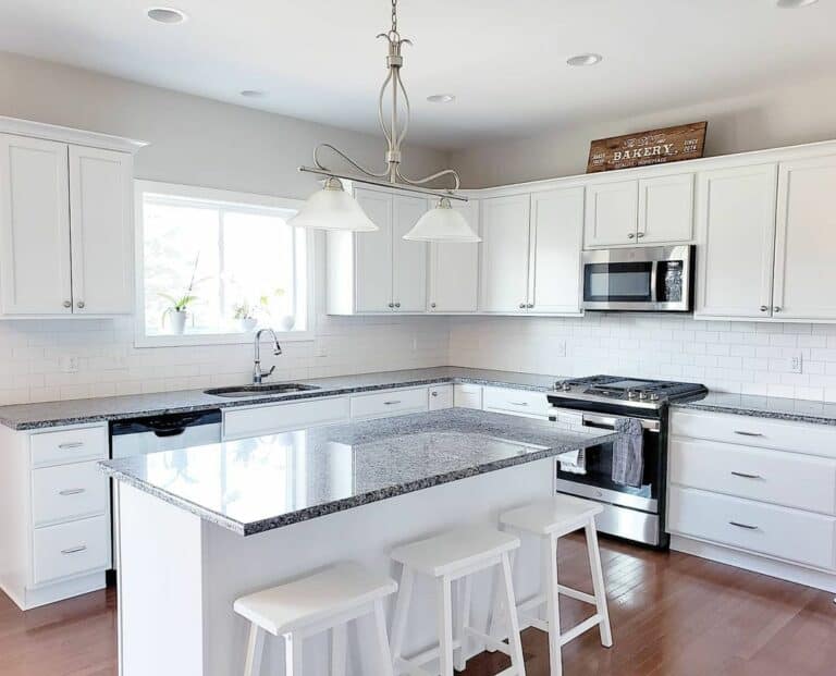 All-white Kitchen With Black Granite Counters
