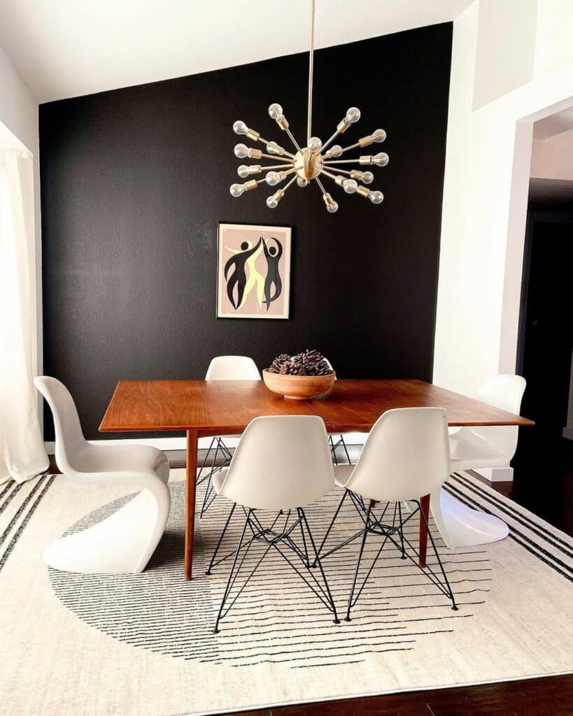Black Accent Wall and Warm Wood Dining Table