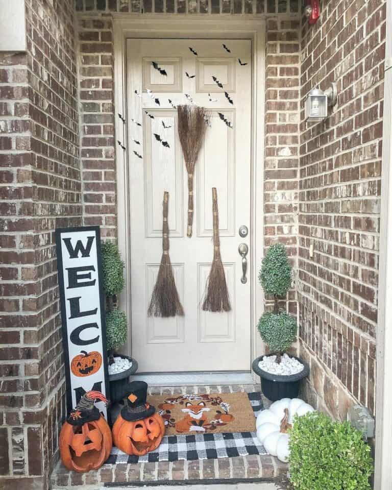 Brick Porch With Witches' Brooms