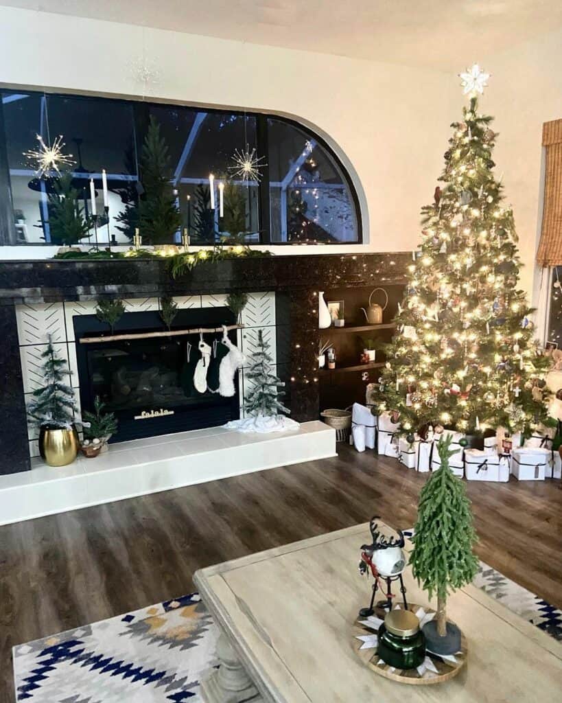 Christmas-themed Living Room With Black Mantel