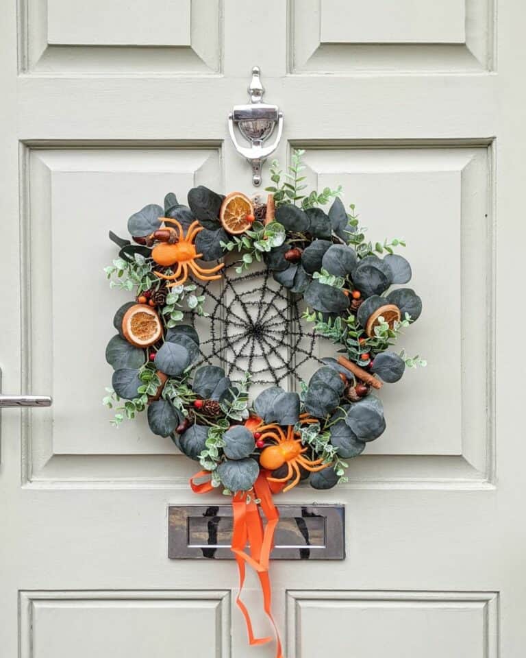Country Front Porch With Black Halloween Wreath