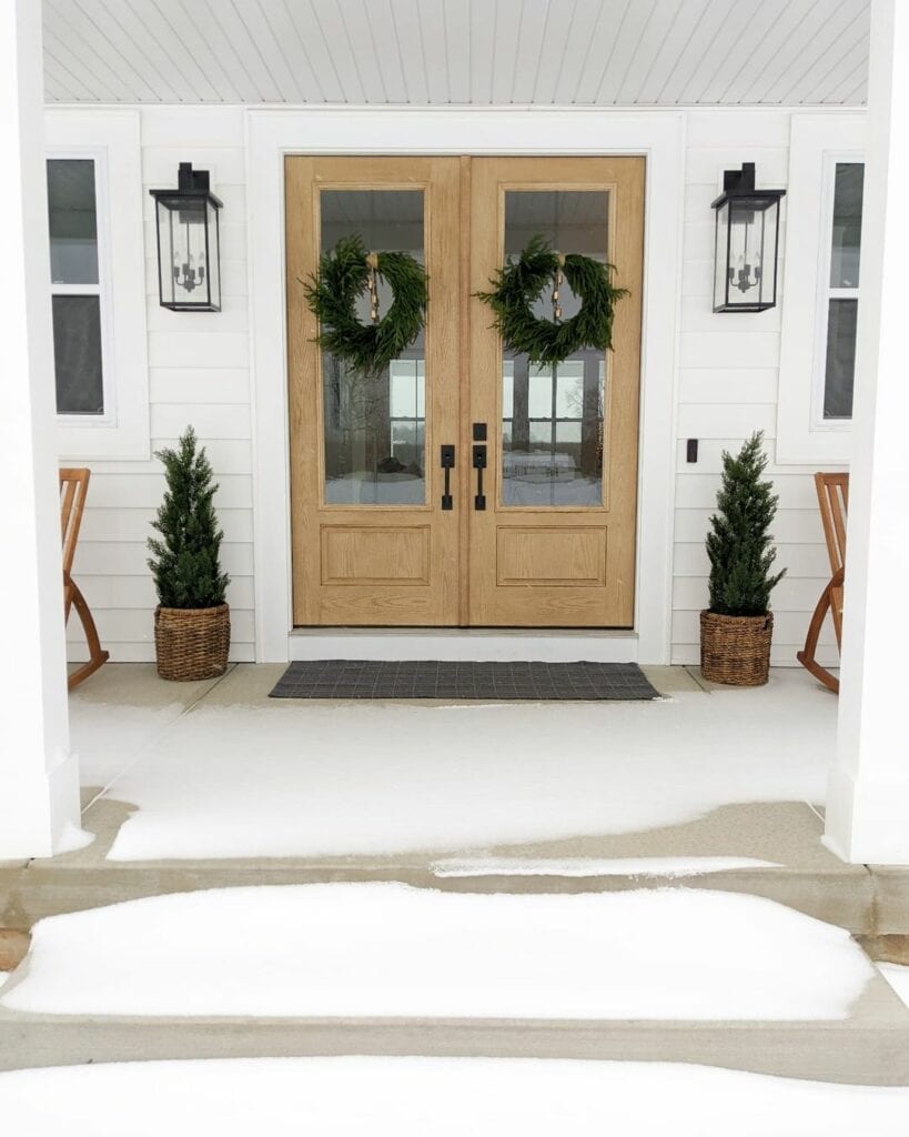 Double Wood Front Doors With Christmas Wreaths
