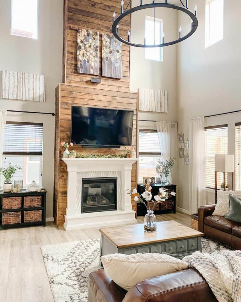 Elevated Wood Fireplace Extends To Vaulted Ceilings