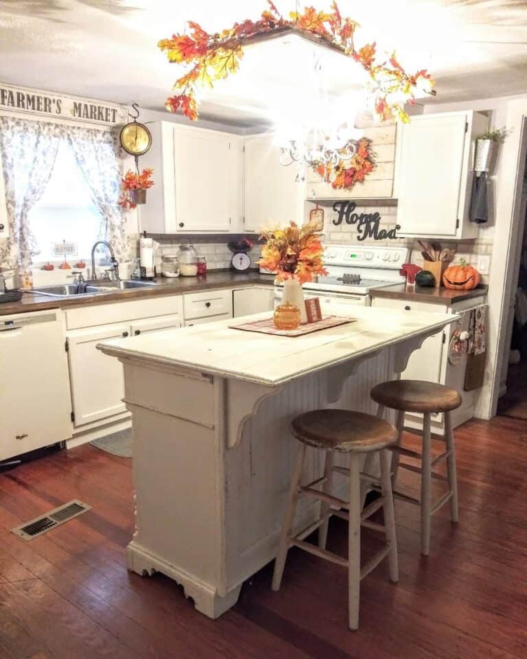 Fall-themed Kitchen With Small White Kitchen Island