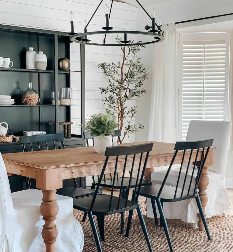 Farmhouse Dining Room With Black Shelf