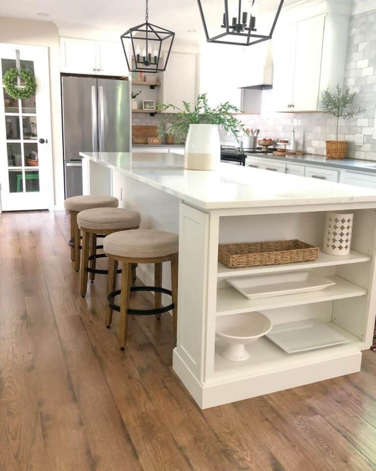 Farmhouse Kitchen With White Island and Round Chairs