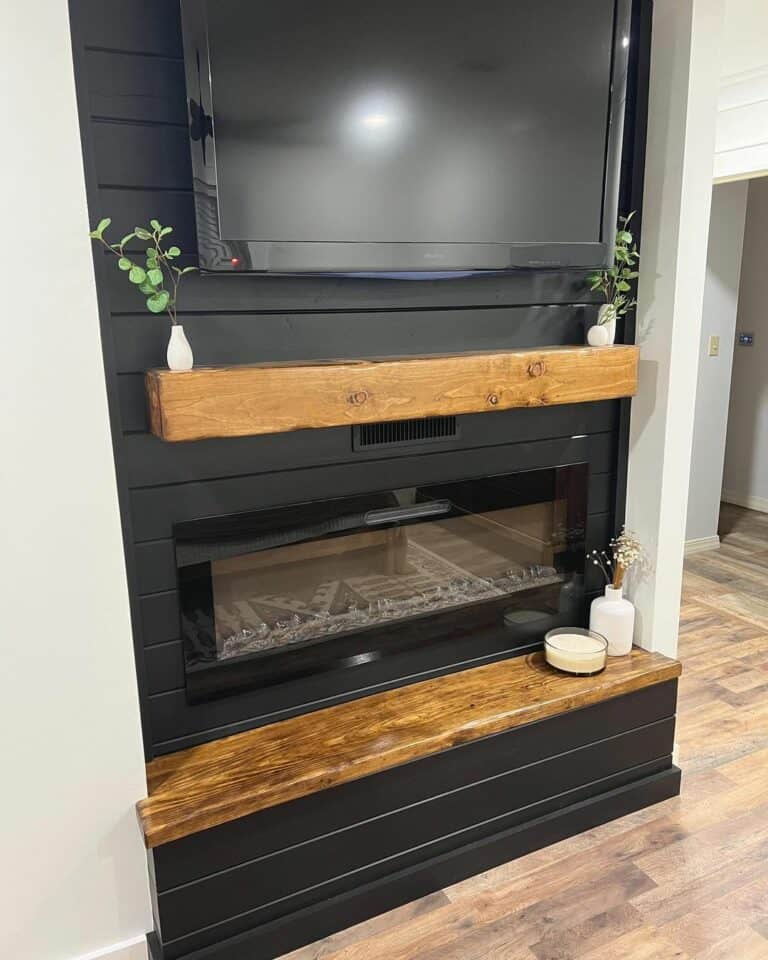 Farmhouse Living Room With Black Shiplap Fireplace