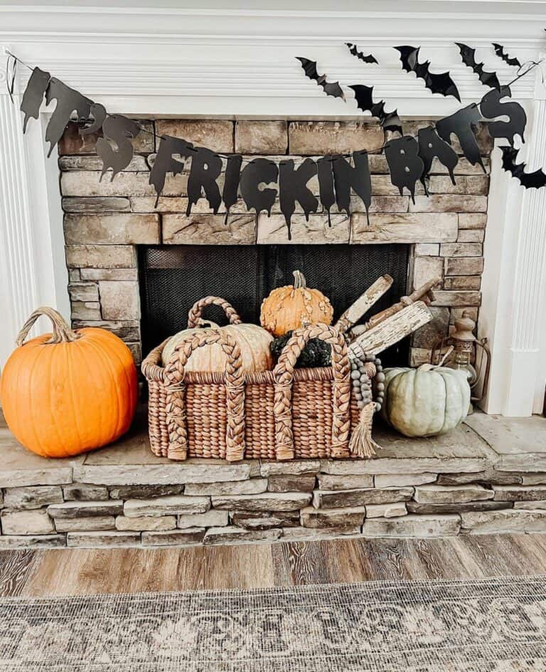 Festive Fireplace Ensemble: Pumpkins Meet Whimsical Bats