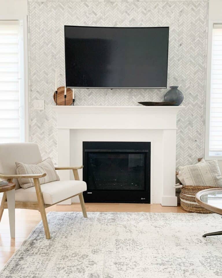 Gray Herringbone Accent Wall With White Fireplace