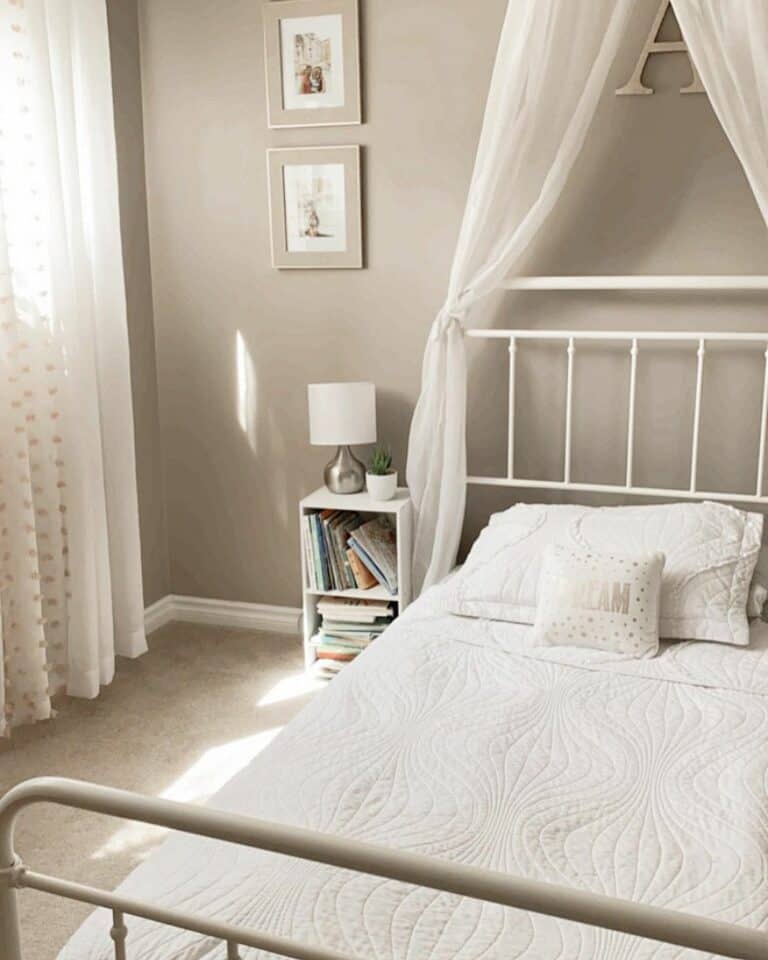 Gray and White Bedroom With Sheer Canopy