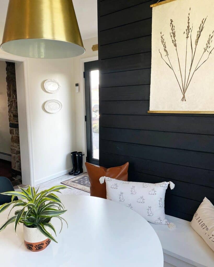Metallic Accents Shine Among Dark Walls