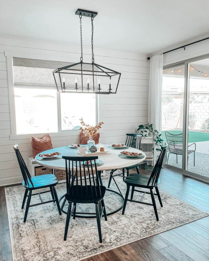 Modern Farmhouse Dining Room With Geometric Lamp