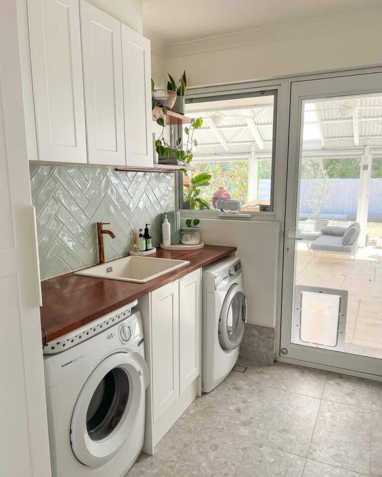 Modern Laundry Room With Tiled Herringbone Wall