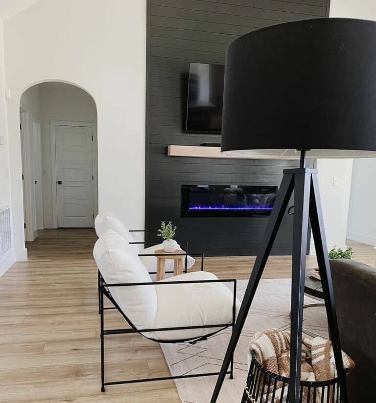 Modern Living Room With Black Shiplap Fireplace