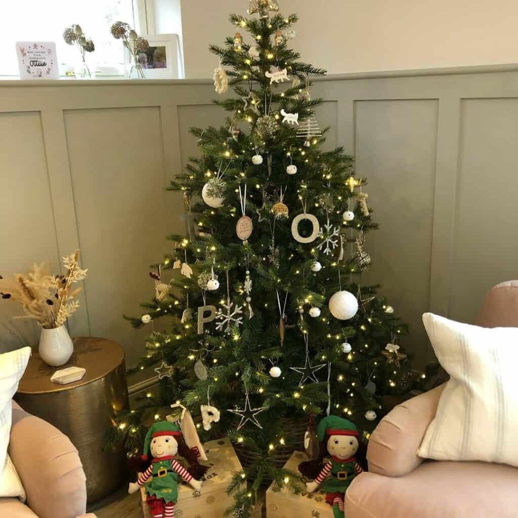 Neutral Christmas Tree With Pale Olive Board and Batten Wall
