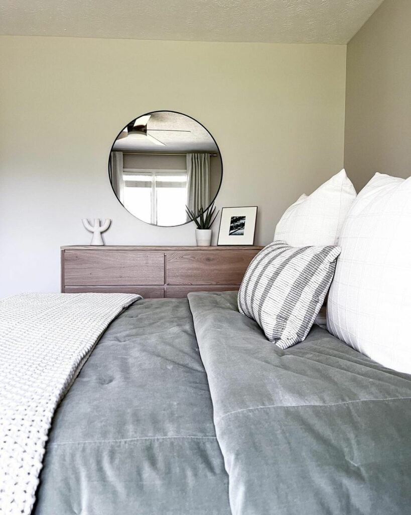 Organic Modern Bedroom With Dark Wood Dresser