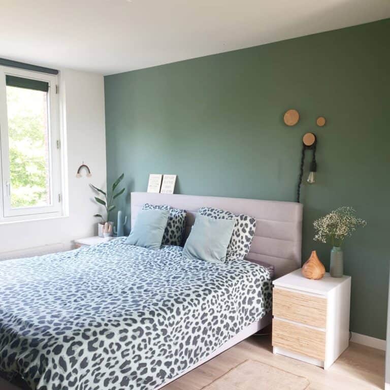 Sage Green Bedroom Wall and Leopard-printed Bedsheets