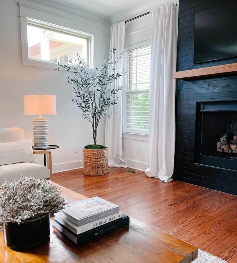 Serene Farmhouse Living Room With Black Shiplap Fireplace