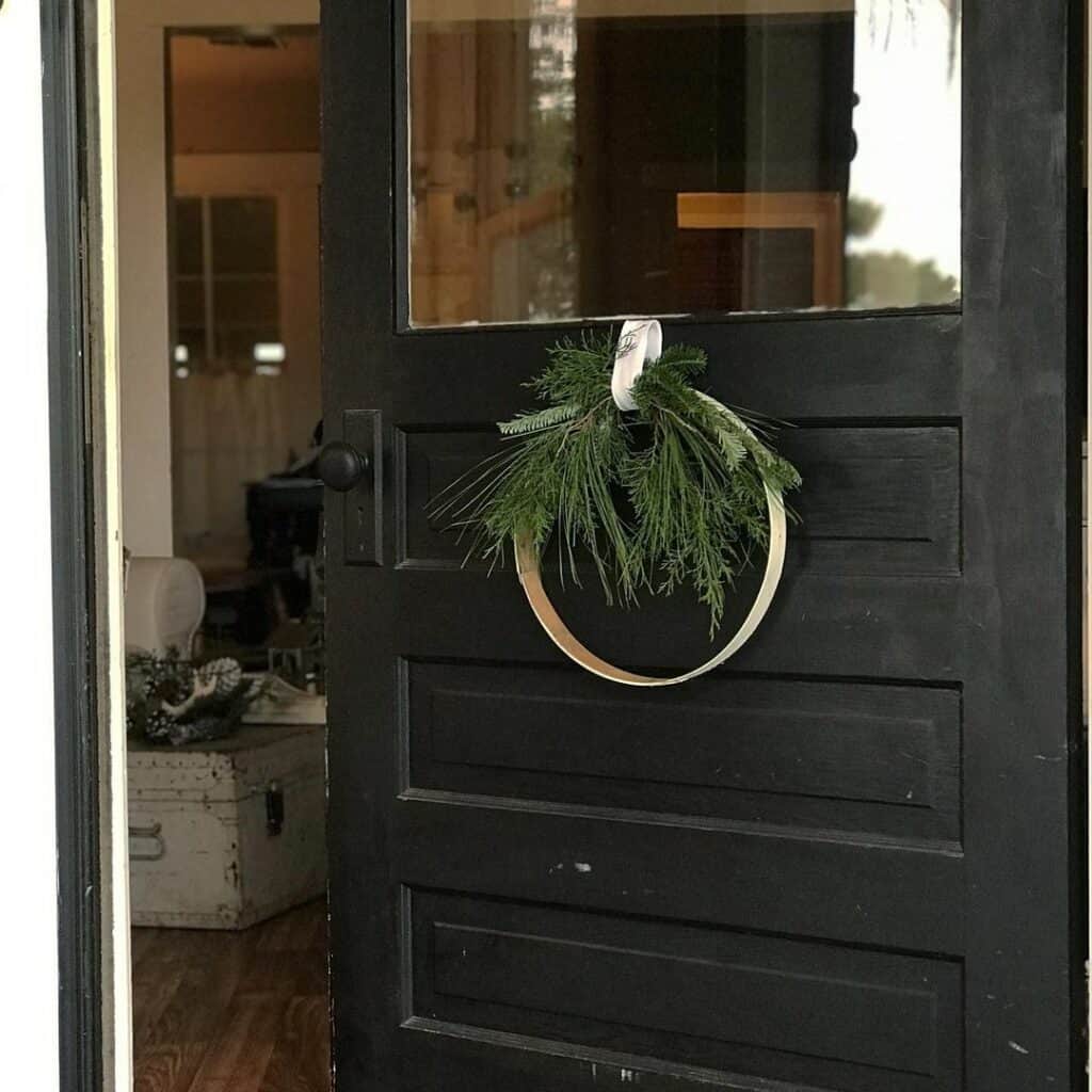 Simple Winter Door Wreath on Modern Black Door