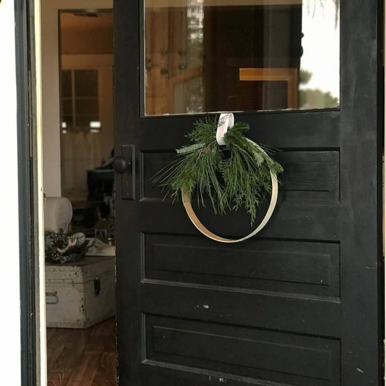 Simple Winter Door Wreath on Modern Black Door