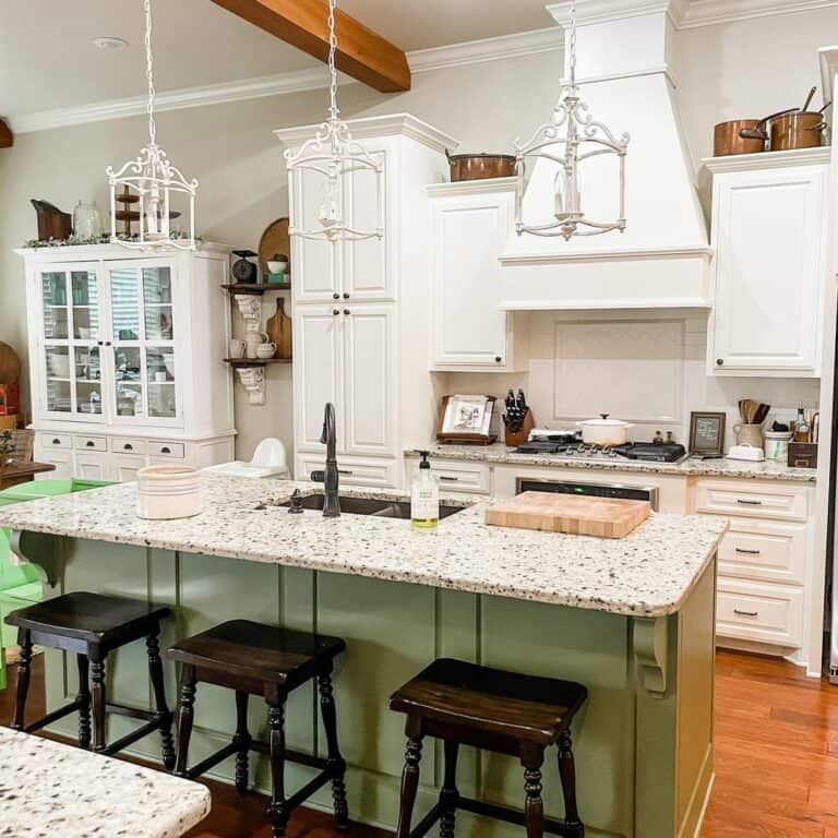 Spacious Farmhouse Kitchen With Green Island