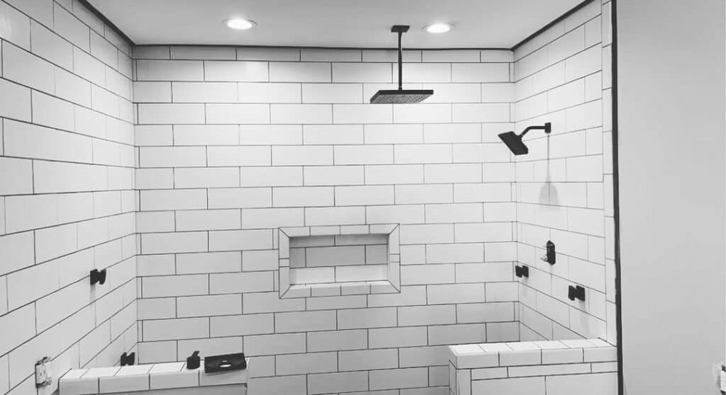 Tiled Shower With Black Hardware