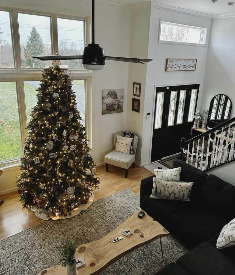 Towering Christmas Tree in Spacious Farmhouse Living Room