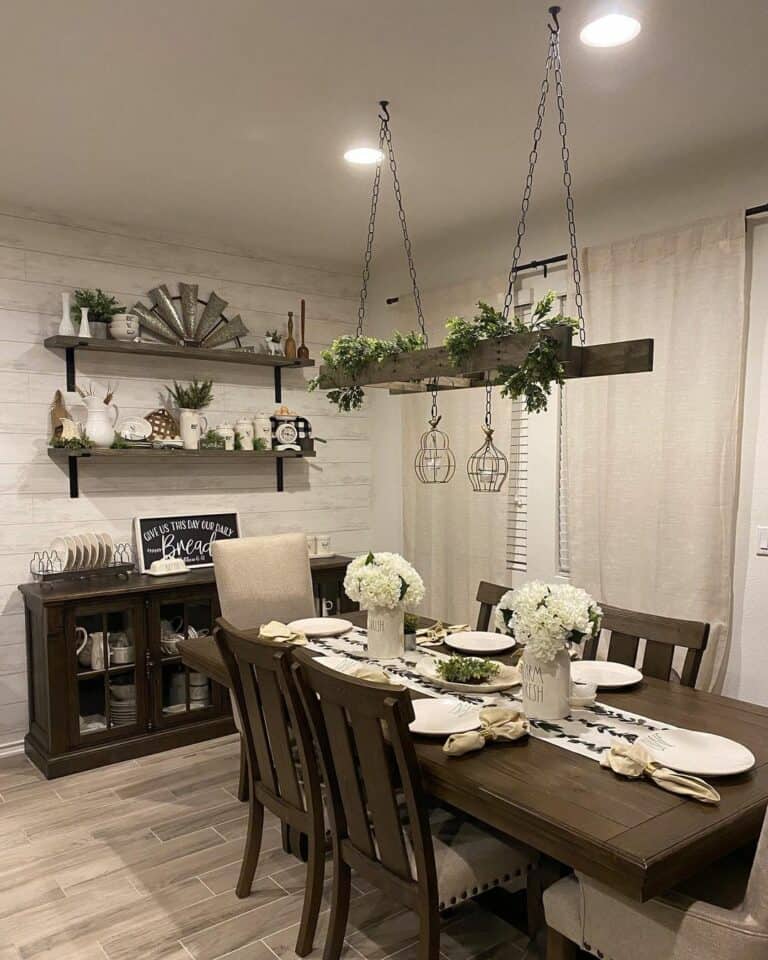 Traditional Farmhouse Dining Room With White Shiplap Wall