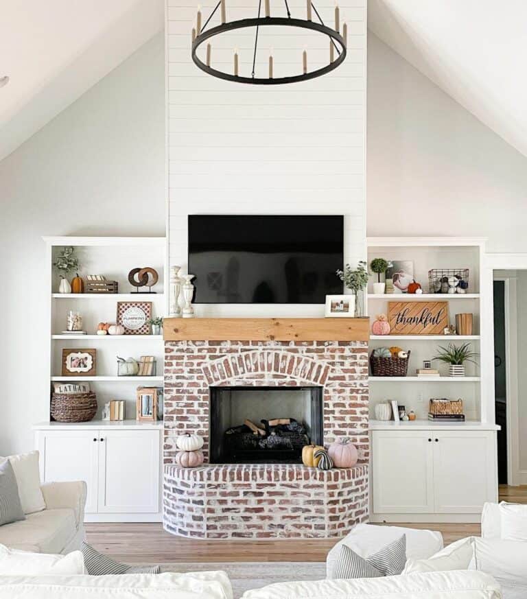 Vaulted Ceilings With Red Brick Fireplace