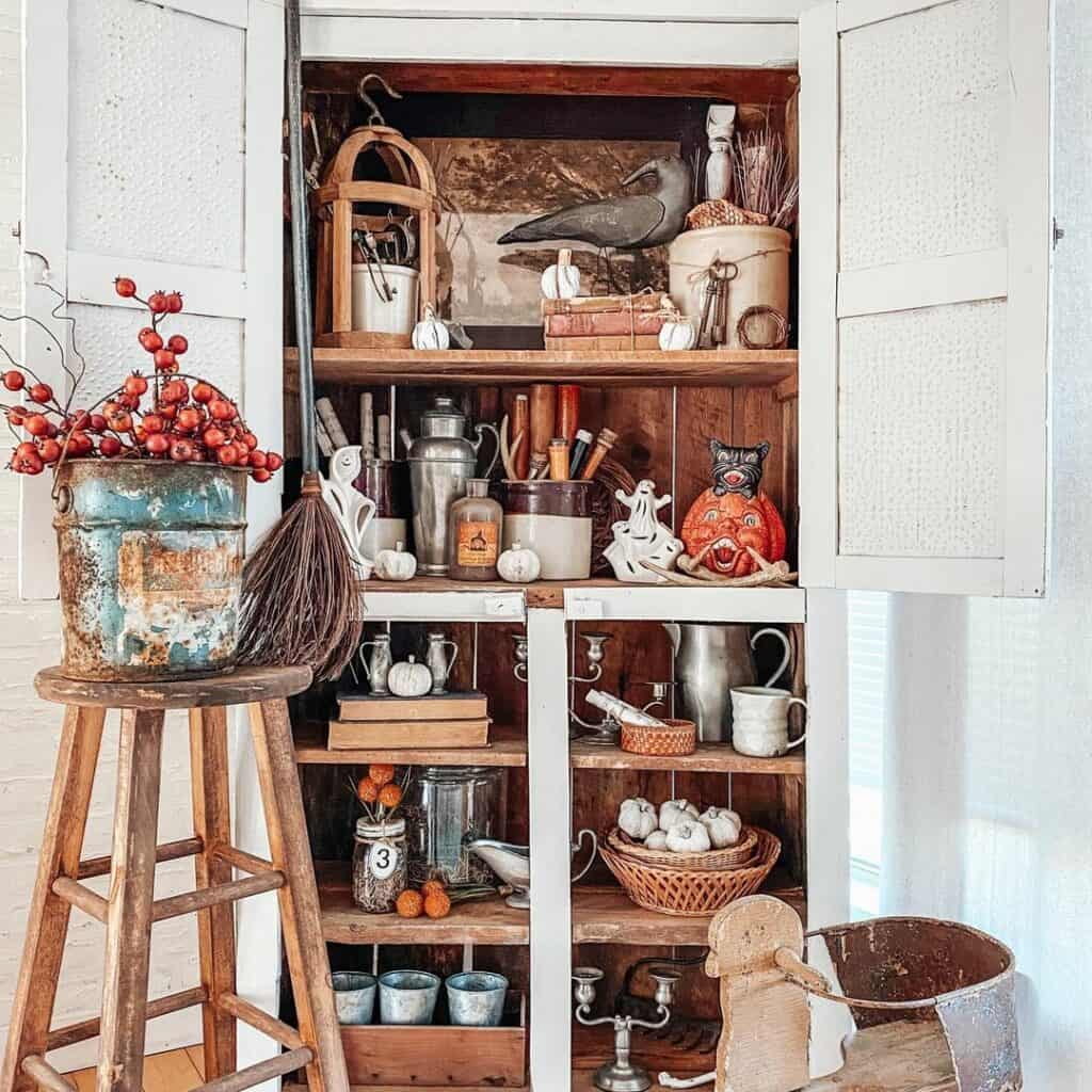 Vintage Halloween Decorations In a Kitchen Pantry