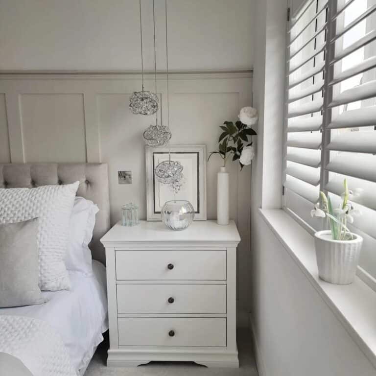 White Bedroom With Plant Décor