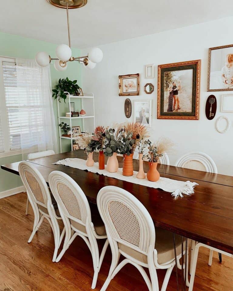 White Chairs Highlight Dining Table