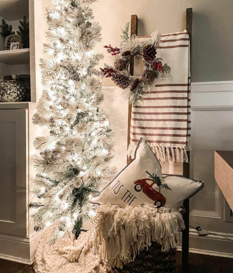 White Christmas Tree With Blanket Ladder in Living Room