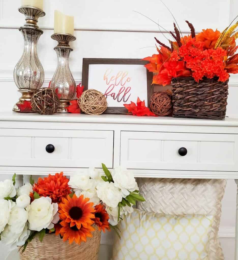 White Entryway With Vibrant Orange Accents