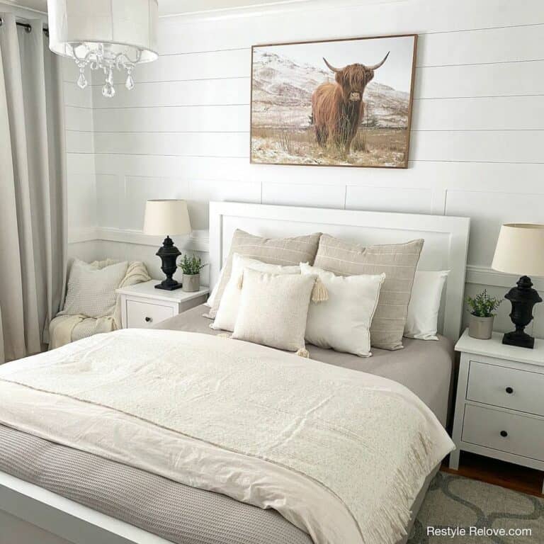 White Farmhouse Bedroom With Colorful Photo