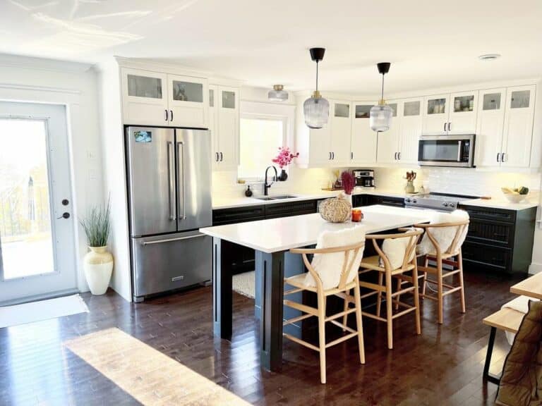 White Farmhouse Kitchen With Black Lower Cabinets