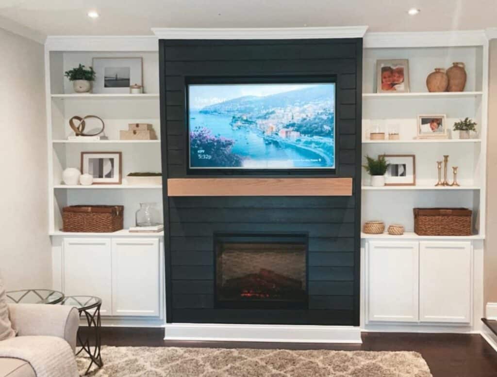 White Farmhouse Living Room With Black Shiplap Wall